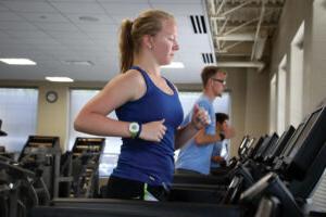 Student exercising on treadmill